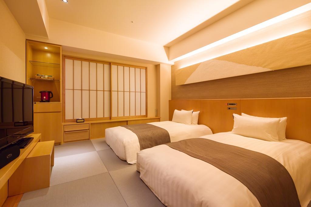 Cocochee Hotel Нумадзу Номер фото