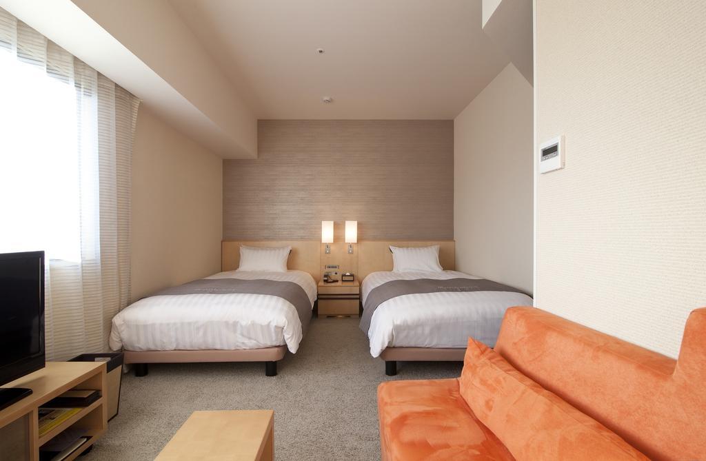 Cocochee Hotel Нумадзу Номер фото